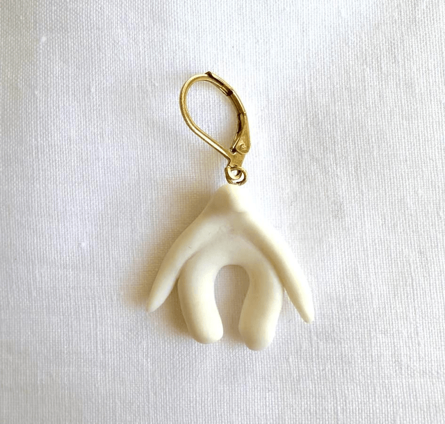 Boucle d'oreille clito